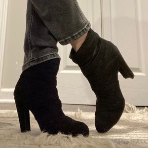 Black suede heeled ankle boots